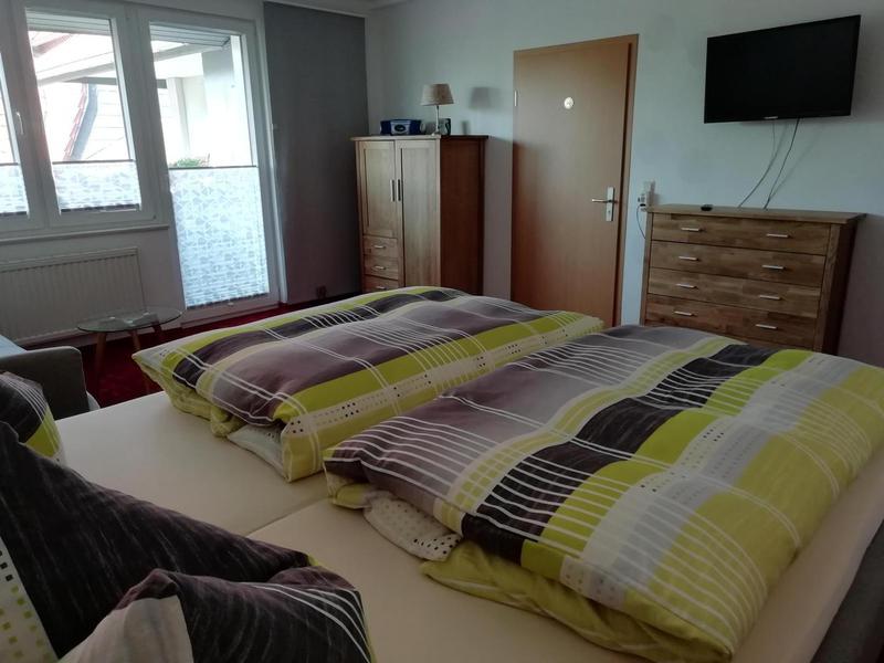 Schlafbereich mit gemütlicher Einrichtung