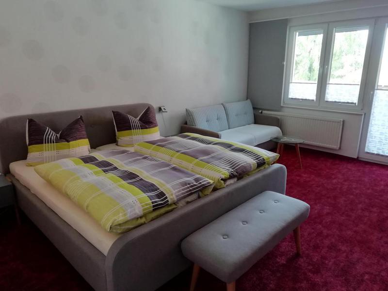 Wohlfühl-Appartement – Schlafbereich mit Doppelbett